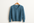 lake-blue cashmere sweater on a coat hanger with white background