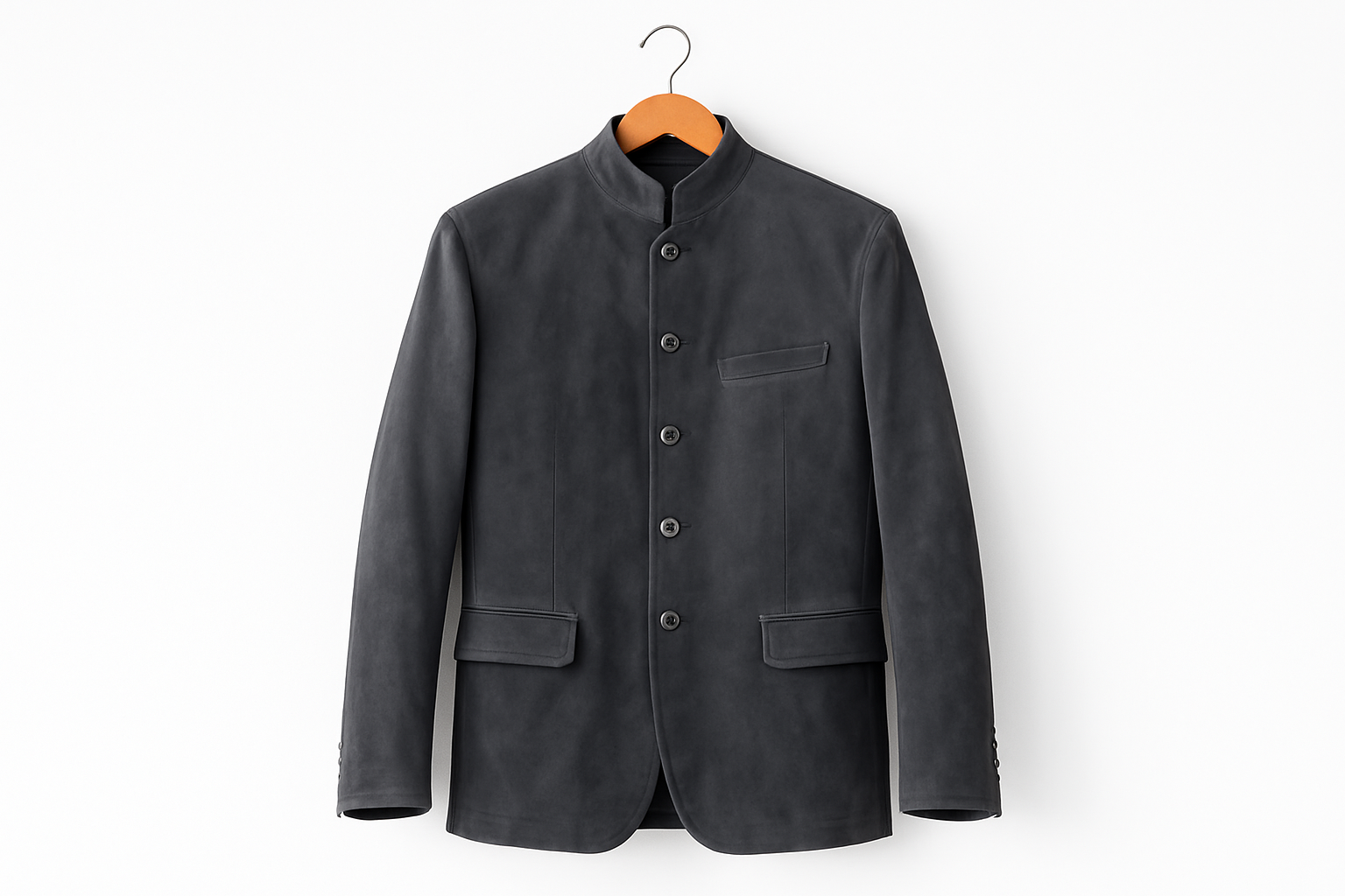 Charcoal gray suede coat hanging on coat hanger